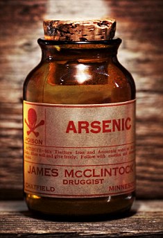 Vintage arsenic poison bottle on antique shelf